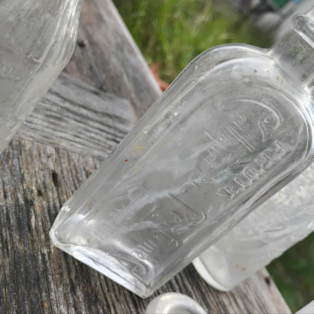 Collection of 8 vintage antique bottles